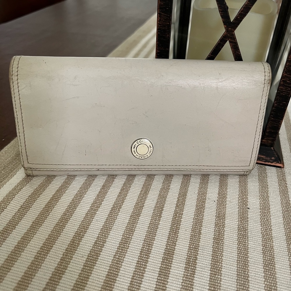Authentic Coach slim wallet in good preowned condition.